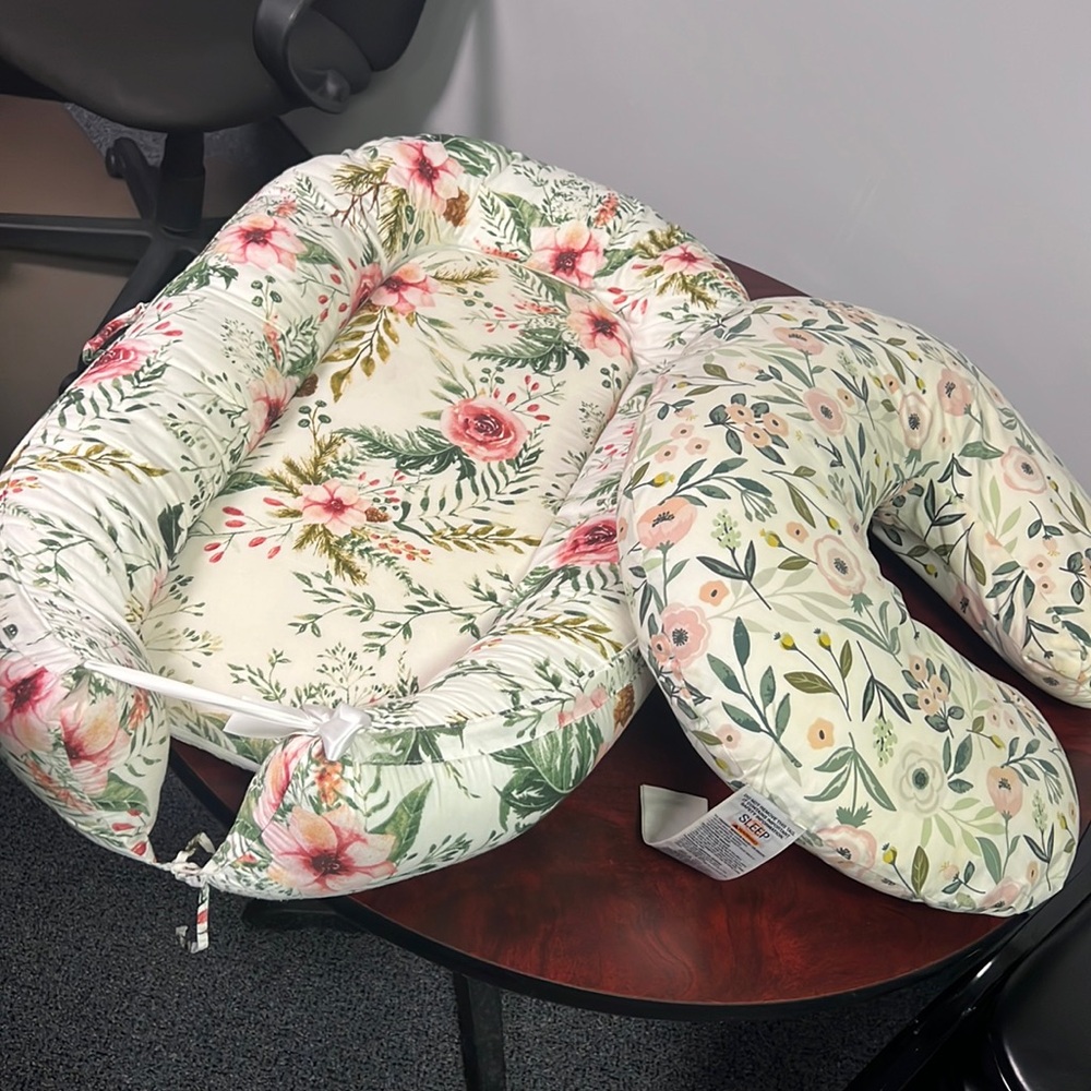 Baby lounger and a breastfeeding pillow/tummy time pillow.
